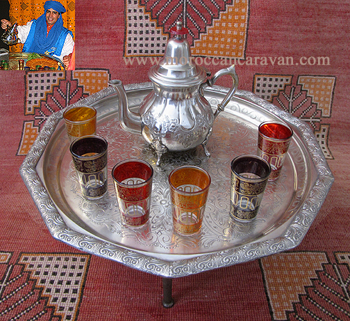 The set includes one silver teapot, 6 tea glasses and a vintage silver tea 